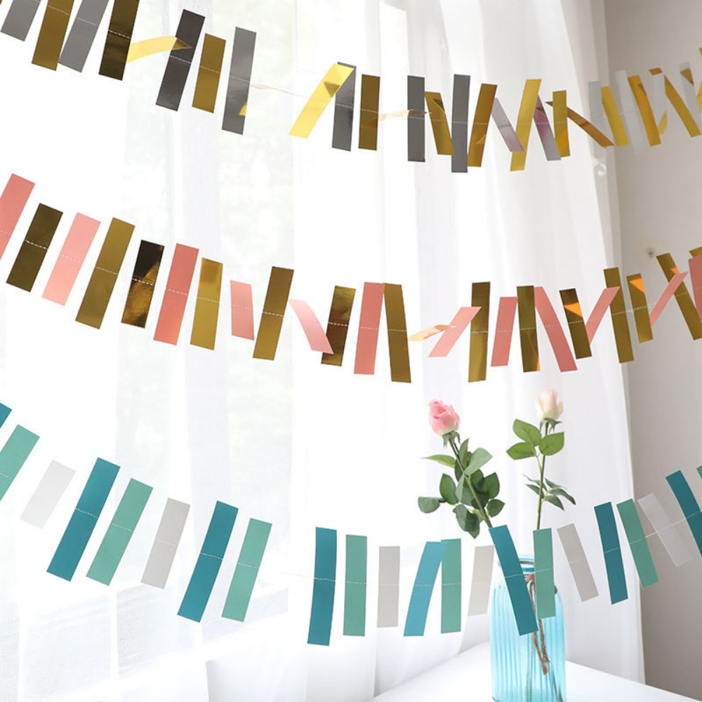 PrismStrips™ – Kinetisk Ljusreflekterande Pappersgirlang